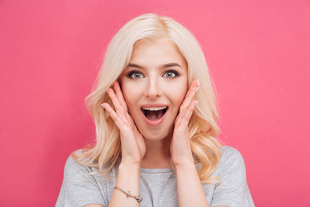 istock Amazed pretty woman looking at camera 524709800