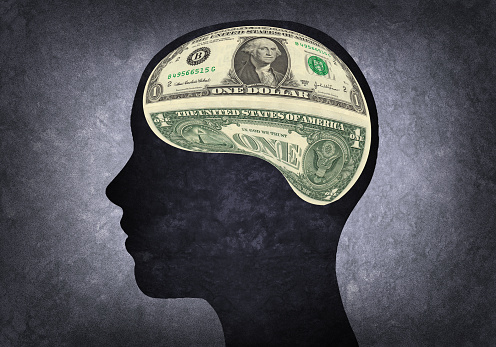 Silhouette of human head with brain US dollar