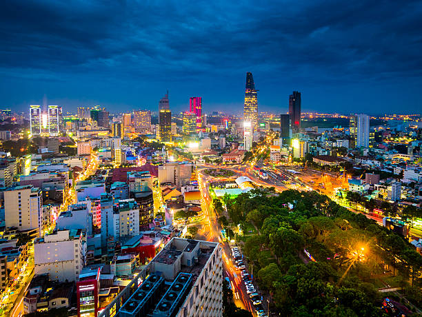 Ho Chi Minh City in Vietnam at night View of the buildings in Ho Chi Minh city or Saigon in Vietnam at night ho chi minh city photos stock pictures, royalty-free photos & images