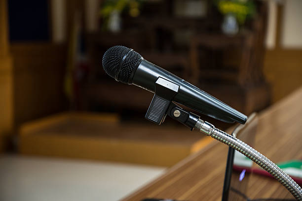 istock Close up of microphone on blur background 524711544