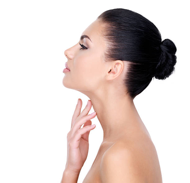 istock Beautiful woman cares for the neck 524712328