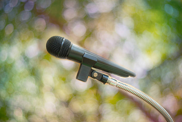 istock Close up of microphone on blur background 524712790