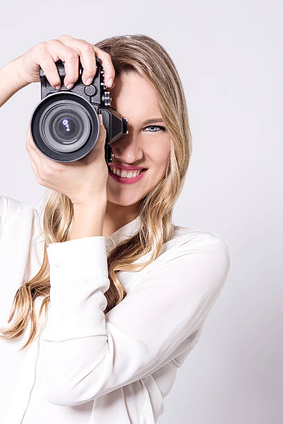 istock Say cheese.....   Female  photographer 524713280