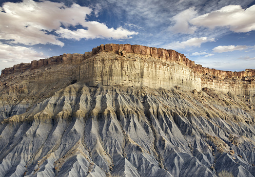 bottom view of a blue rocky cliff in Utah