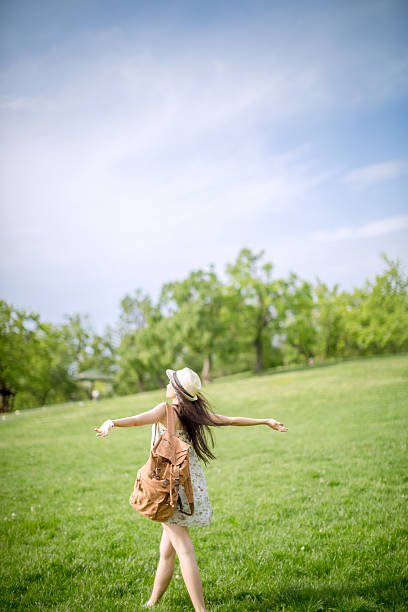 istock woman with open arms 524714494