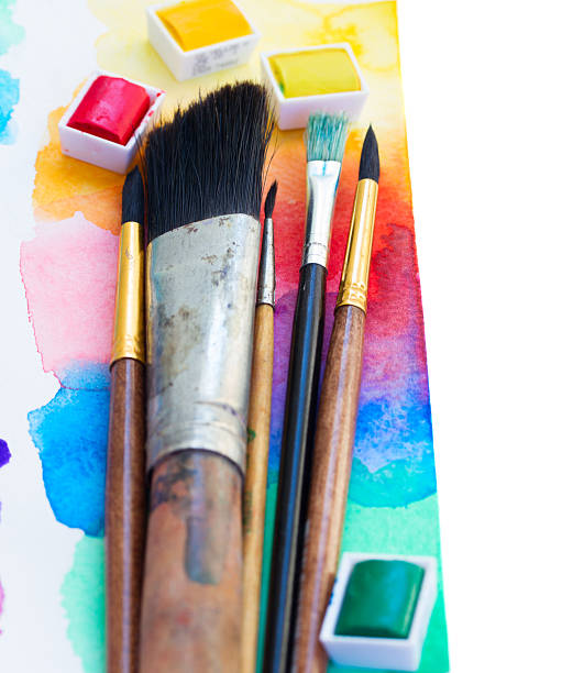 istock brushes and watercolor paints border 524717205
