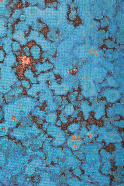 istock worn turquoise paper- Stock Image 524719235