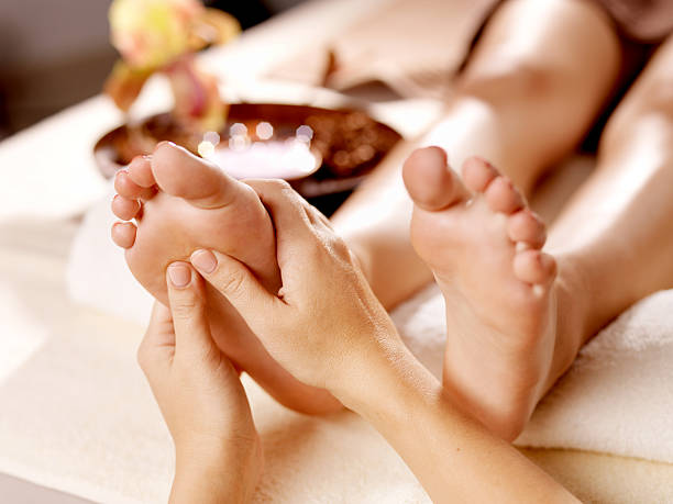 istock Massage of human foot in spa salon 524720020