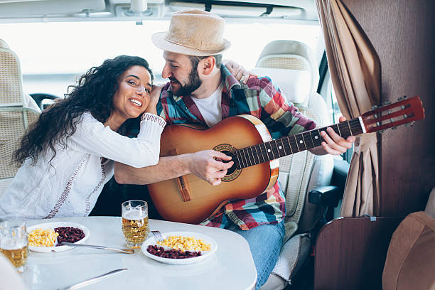 istock Young couple having fun in camper van 524722496