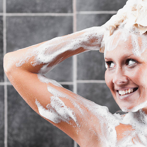 istock young sexy woman having a shower 524722873
