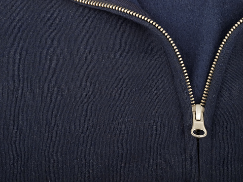 detail of sweatshirt with zipper, studio shot