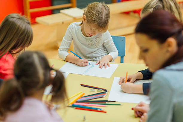 istock Happy Little Girl in kindergarten 524724896