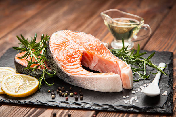 istock Fresh salmon on old wood 524726382