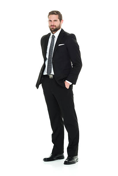 istock Businessman standing and looking at camera 524726692