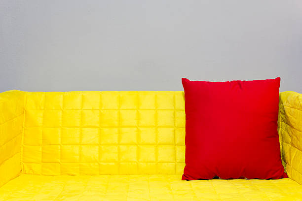 istock red backrest pillow on yellow fabric armchair 524739873