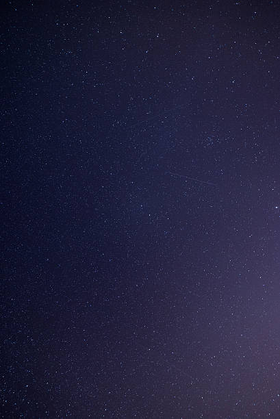 istock night sky with stars on the beach. space view. 524740041