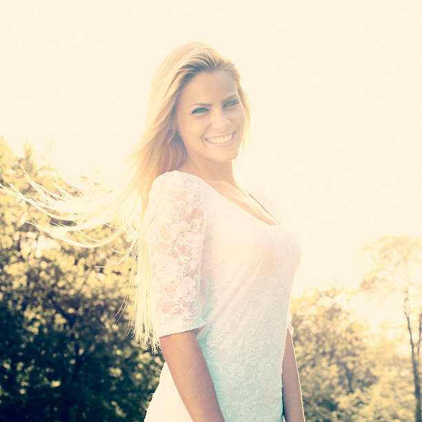 istock Beautiful woman in park 524740799