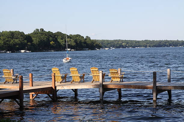istock Lounge Chairs On A Dock Of The Lake 524742755