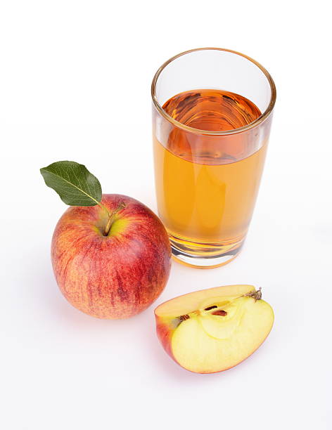 istock Close-up shot sliced red apple with juice view from top 524744207
