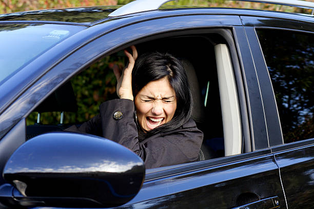 istock Woman in car shouting because of accident 524771647