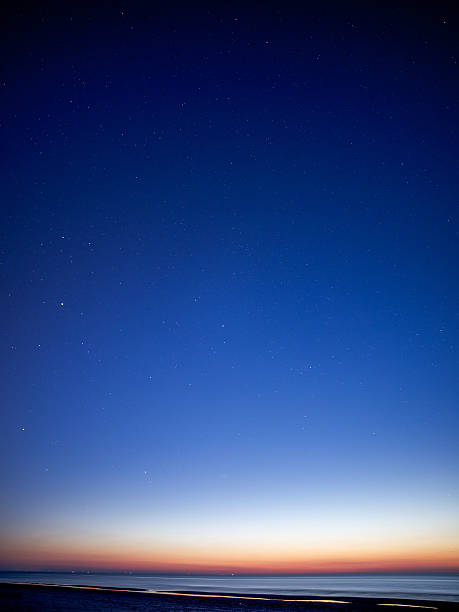 istock night sky with stars on the summer beach 524771773