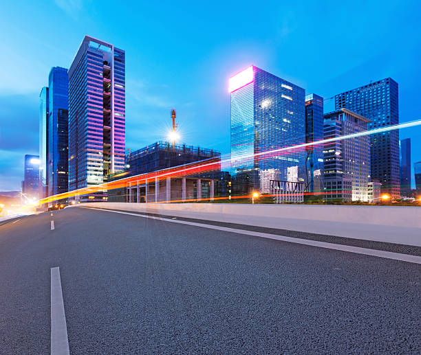 istock Asphalt road and modern city 524771879