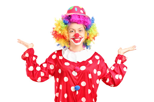 Female clown gesturing with hands isolated against white background