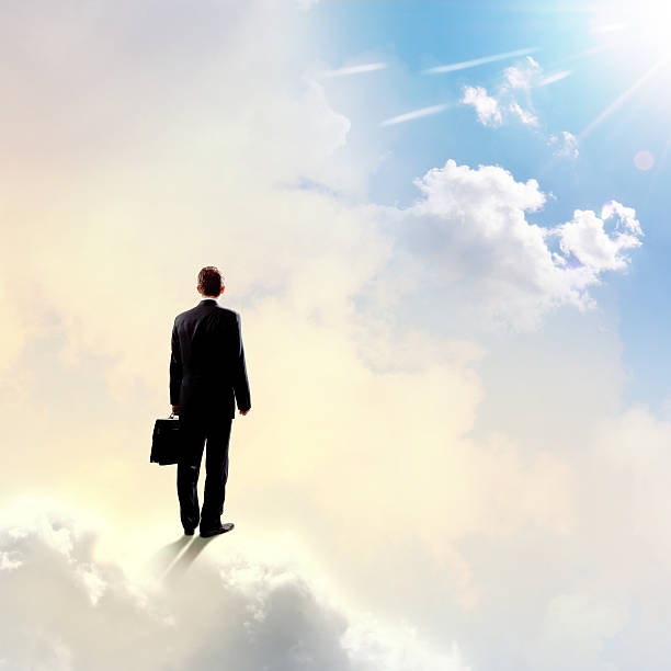 istock Businessman in heaven 524773881