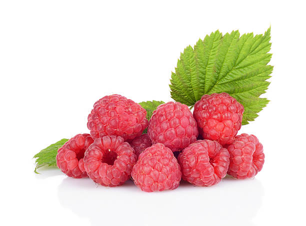 istock Few raspberries stacked in pile with leaves isolated white 524774045