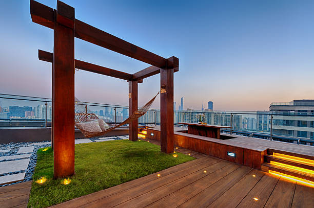 Roof terrace with hammock on a sunny day Roof terrace with hammock on a sunny day in Shanghai wooden porch stock pictures, royalty-free photos & images