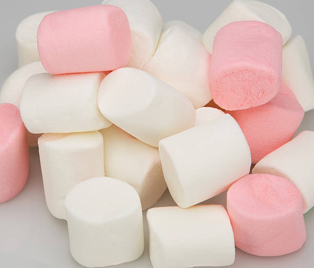istock Pile of marshmallow , isolated on light background 524775669