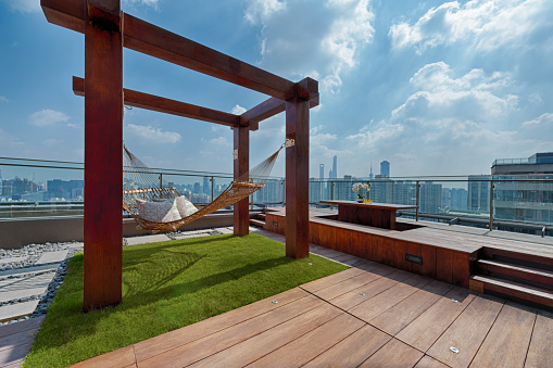 Roof terrace with hammock on a sunny day in Shanghai