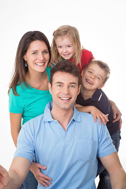 istock amused family on white background 524779121