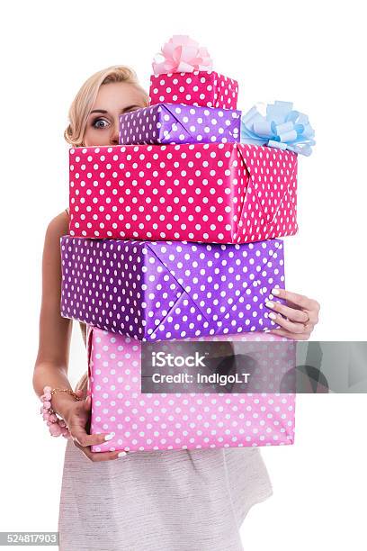 Beautiful Blonde Woman Looking Through Colorful Gift Boxes Stock Photo - Download Image Now