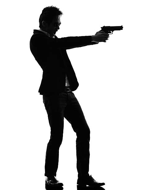 istock asian gunman killer  silhouette 524819135