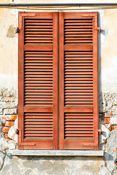 istock red window  varano   venetian blind in the concrete  brick 524821587