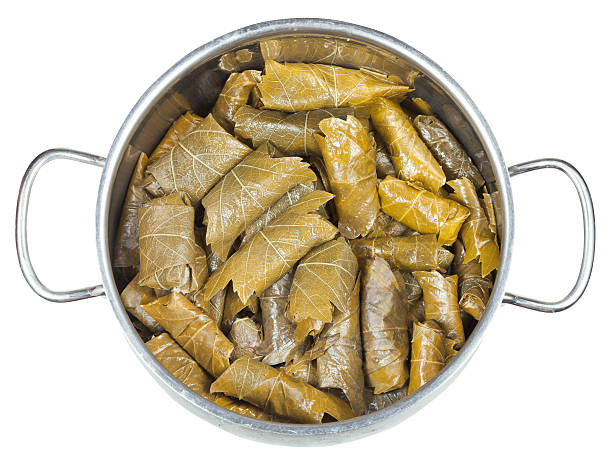 istock dolma from vine leaves and mince in stewpan 524824015