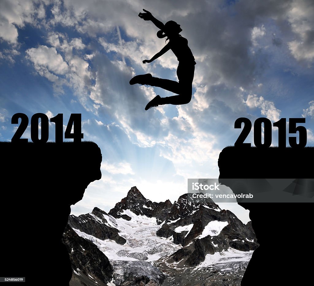 Girl jumps para el nuevo año 2015 - Foto de stock de 2014 libre de derechos