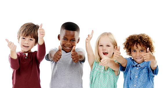 Studio shot of a group of young friends giving you thumbs up together against a white background