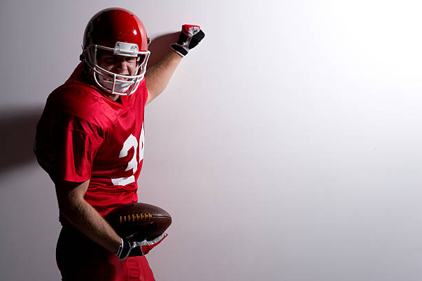istock American football player cheering towards the camera 524858751