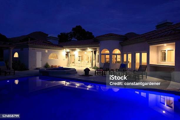 Stunning Pool And Home With Lights At Night Stock Photo - Download Image Now - Night, Swimming Pool, House