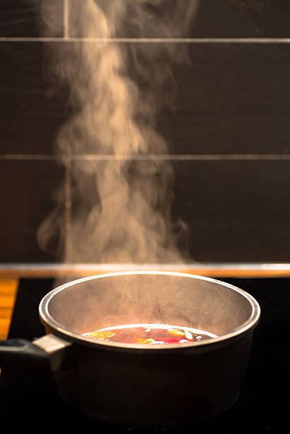 istock pan of boiling red wine sauce 524859947