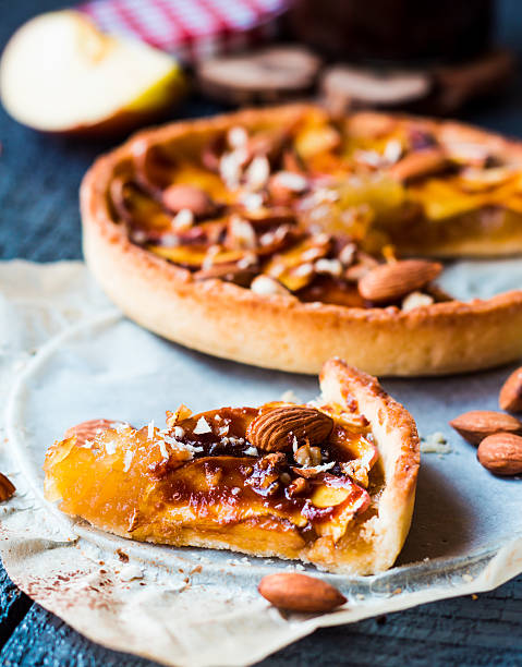 istock slice of tart with pear jam, apples and caramel 524859971