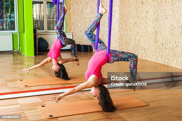 Woman Doing Antigravity Aerial Yoga Stock Photo - Download Image Now - Activity, Adult, Adults Only