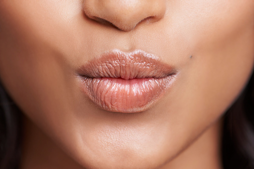 Cropped shot of a woman's beautiful lips