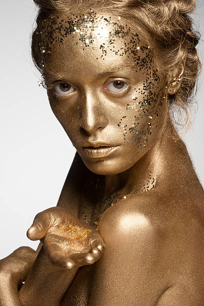 istock Golden woman 524861273