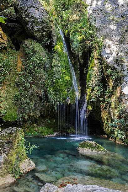 istock beautiful waterfall in the mountains in pamplona 524861683