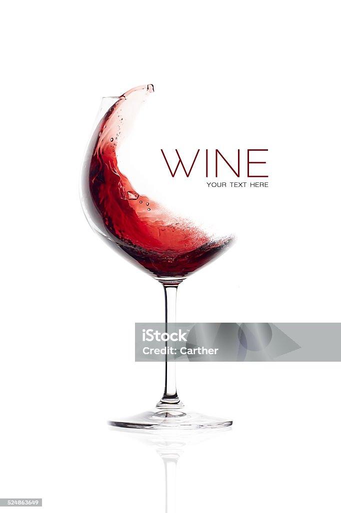 Red Wine in Balloon Glass. Splash Design Red wine in balloon glass. Splash design. Wineglasses isolated on white background with sample text Wine Stock Photo