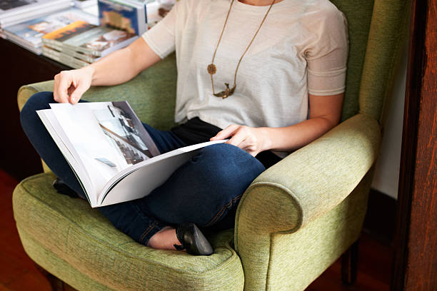 istock Absorbed in the pages of a book 524878239