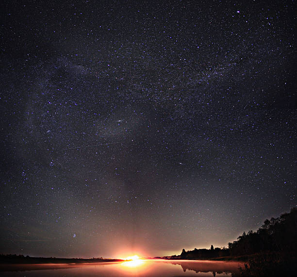 istock starry night sky lake landscape 524878809